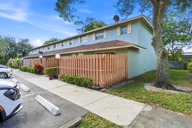 a front view of a house with garage