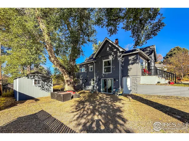 a view of swimming pool with seating area