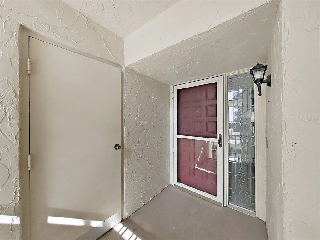 700 Starkey Road, Unit 624 Largo, FL 33771 - Photo 3 of 24 a view of elevator with hallway