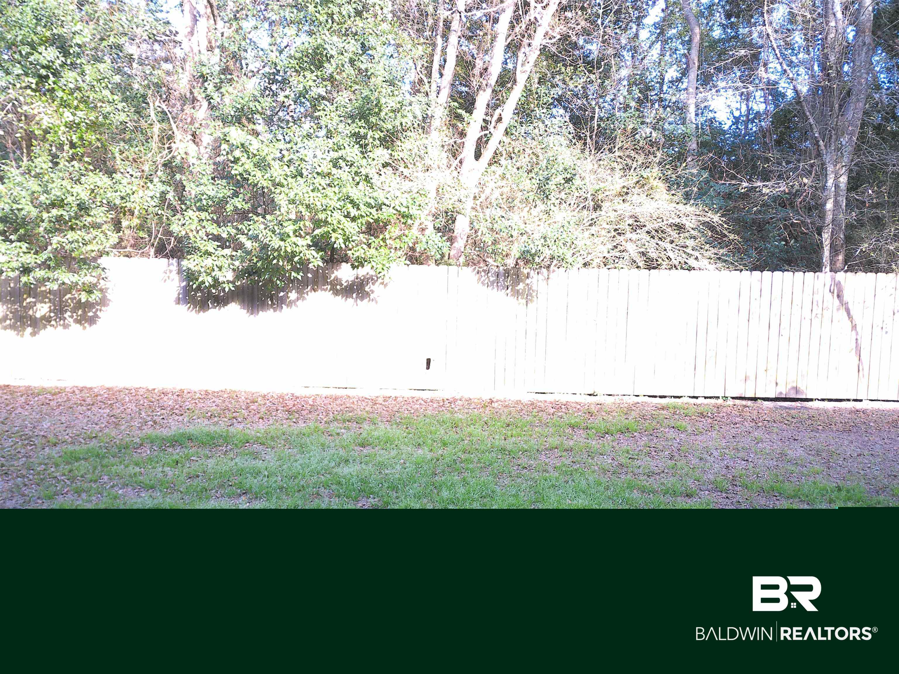 25806 Pollard Road, Unit 23 Daphne, AL 36526 - Photo 14 of 16 View of yard