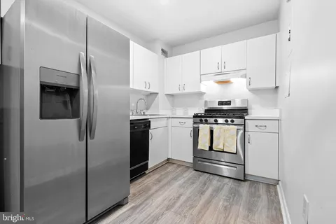 a view of a bathroom from the hallway