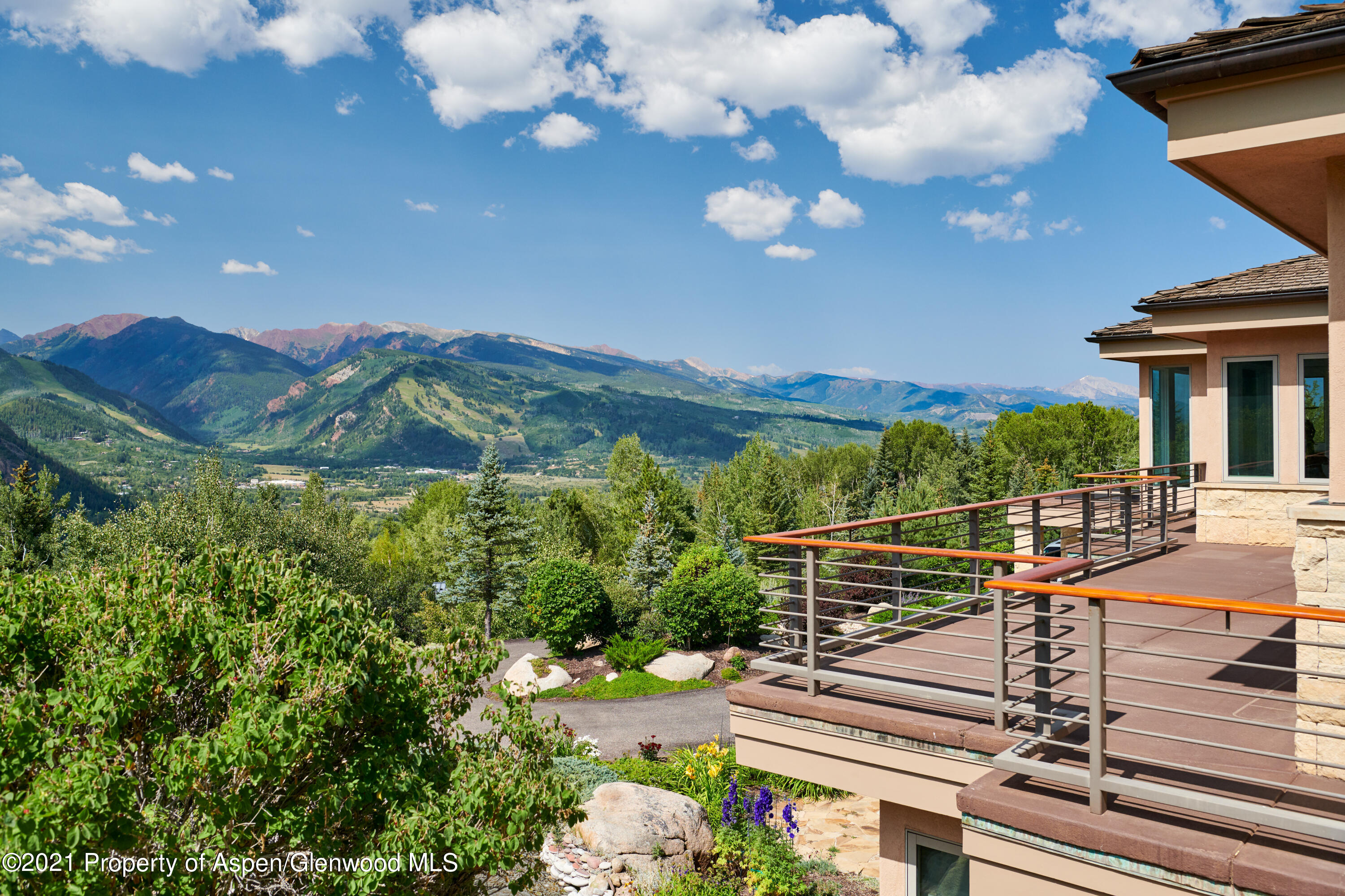 804 Hunter Creek Road Aspen, CO 81611 - Photo 21 of 31 a view of a chairs and table in the balcony