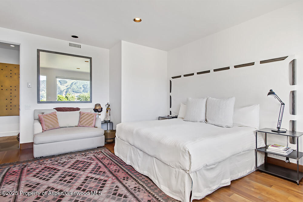 804 Hunter Creek Road Aspen, CO 81611 - Photo 24 of 31 a bedroom with a bed and a couch