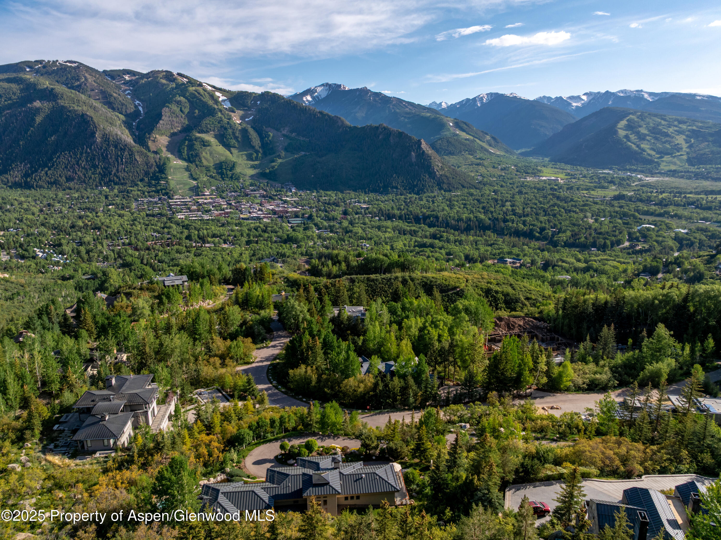 804 Hunter Creek Road Aspen, CO 81611 - Photo 30 of 31 a view of a lush green hillside and houses
