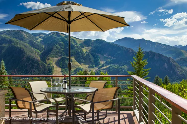 a view of chair and table in the terrace