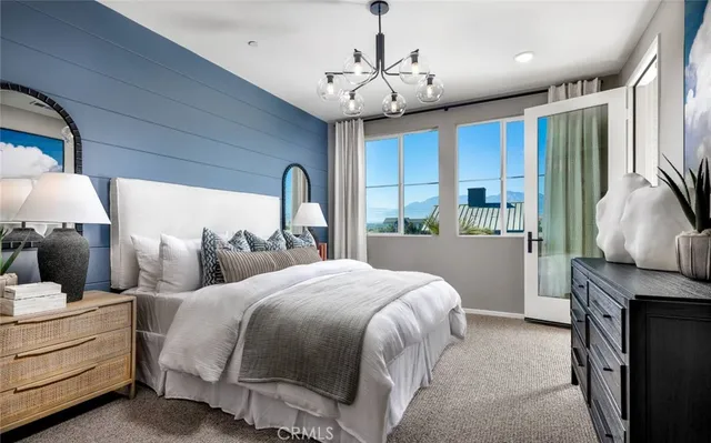 a bedroom with bed and window