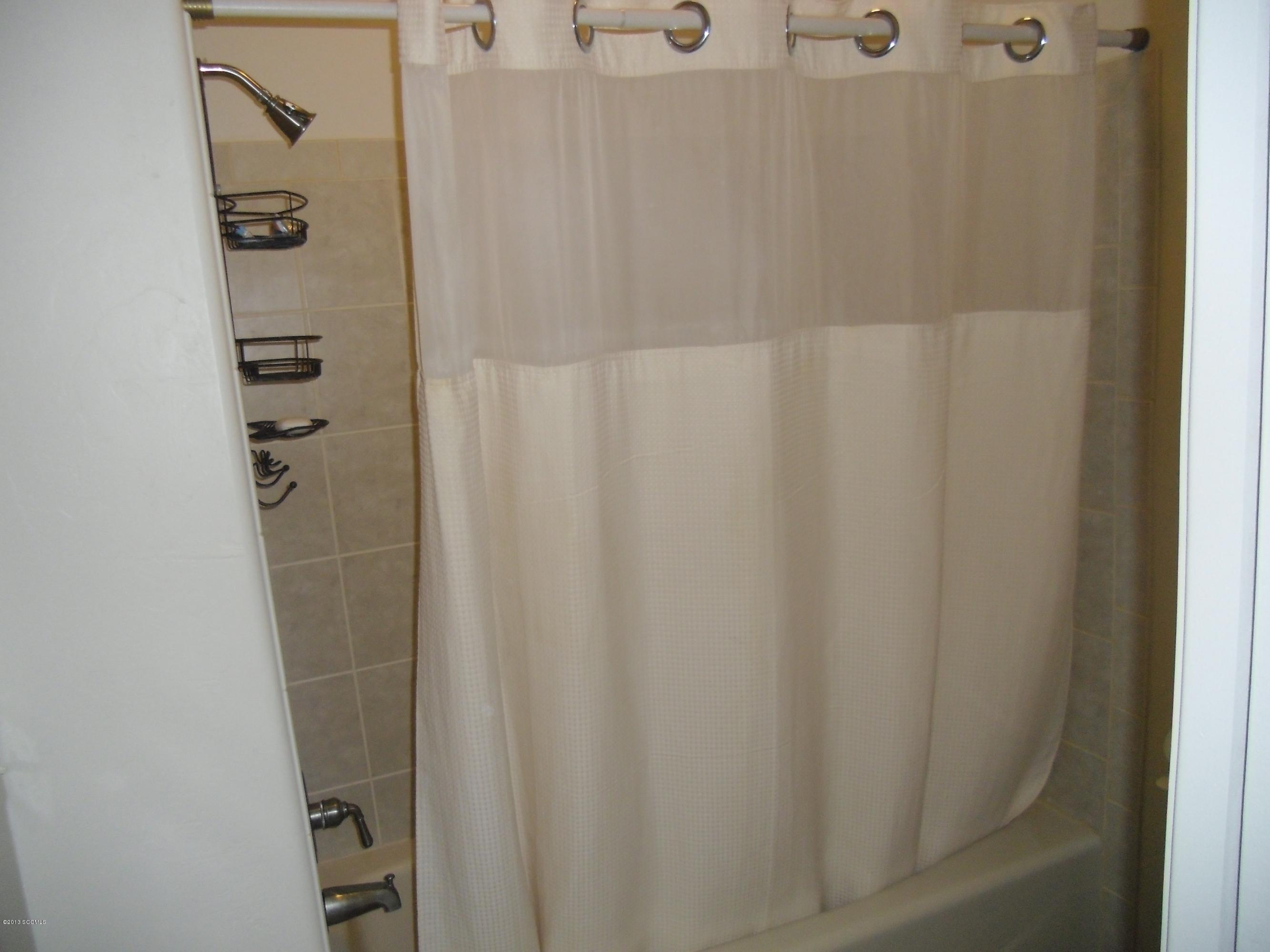 942 Via Puebla Rio Rico, AZ 85648 - Photo 7 of 73 a bathroom with a shower
