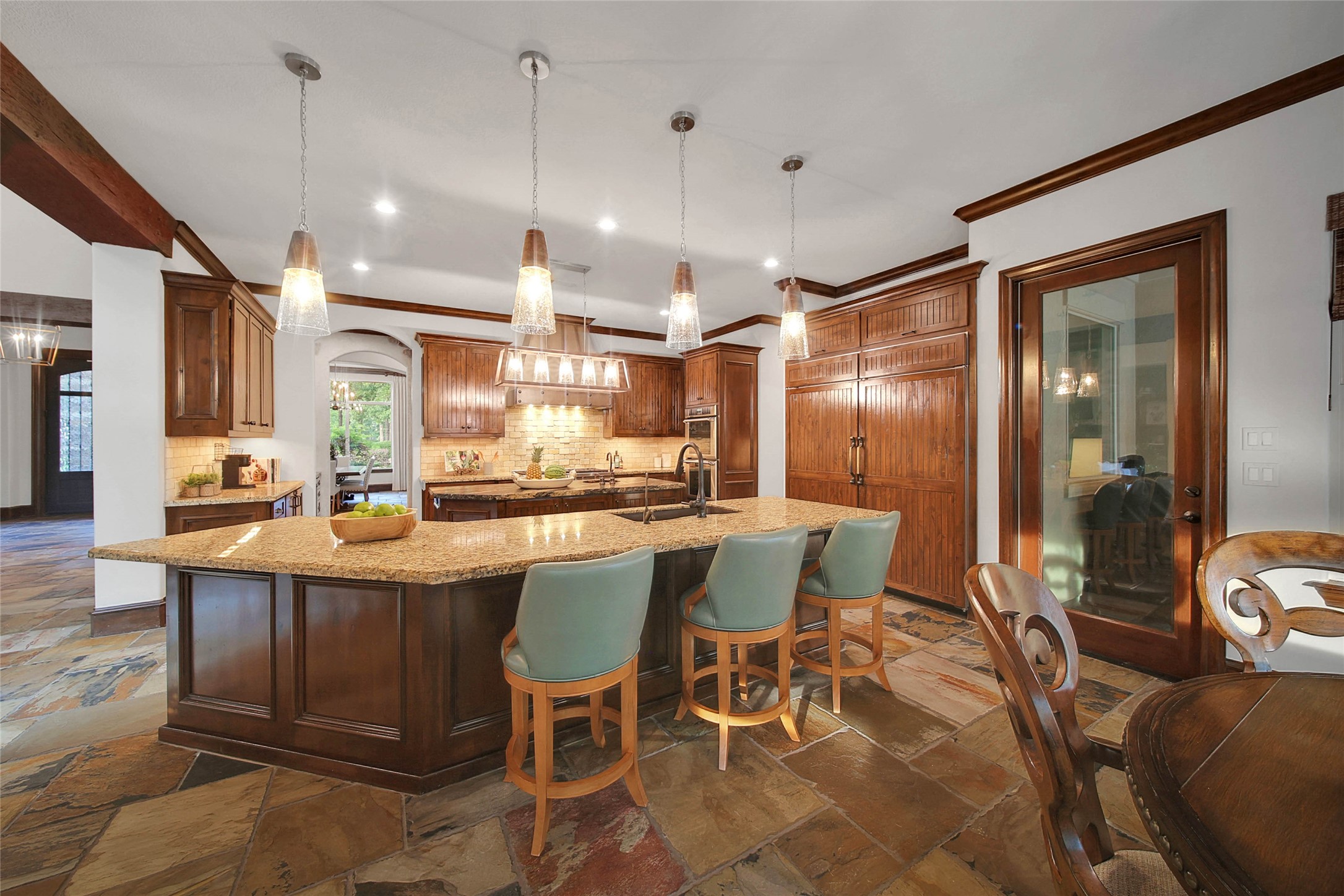 852 Eagle Pointe Montgomery, TX 77316 - Photo 18 of 48 a dining table with chairs and kitchen view