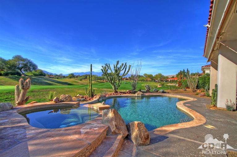 178 Loch Lomond Road Rancho Mirage, CA 92270 - Photo 2 of 32 a view of a swimming pool with a patio