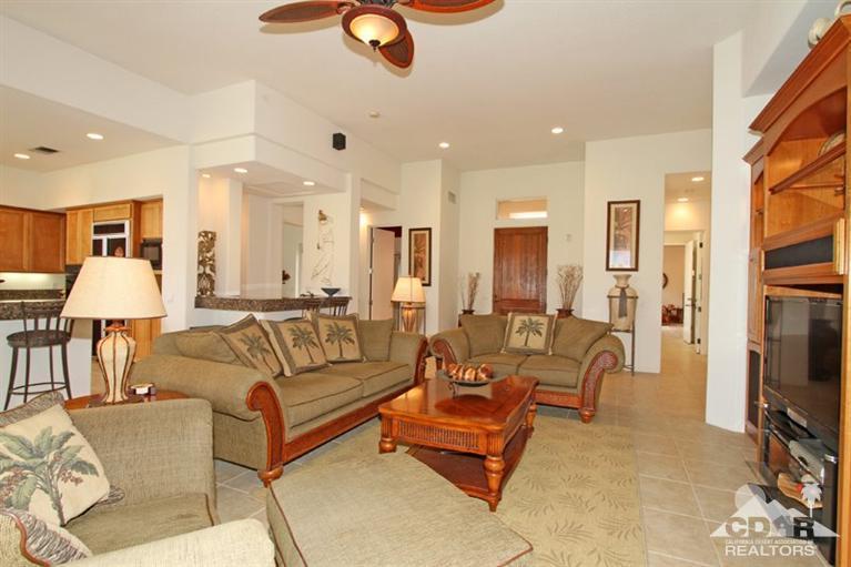 178 Loch Lomond Road Rancho Mirage, CA 92270 - Photo 12 of 32 a living room with furniture and a flat screen tv
