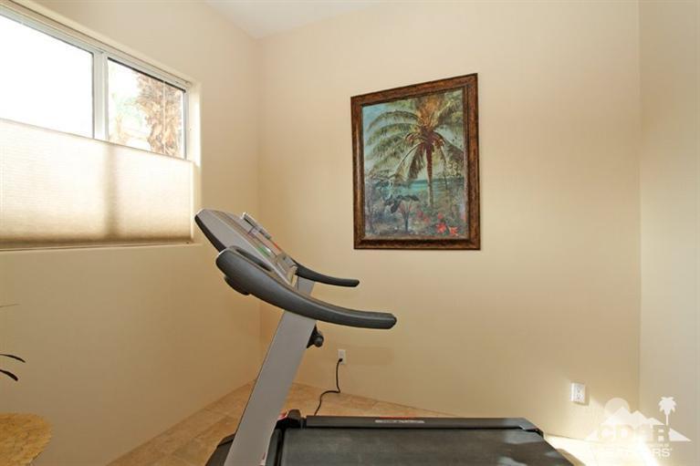 178 Loch Lomond Road Rancho Mirage, CA 92270 - Photo 24 of 32 a view of a room with a window and a ceiling fan