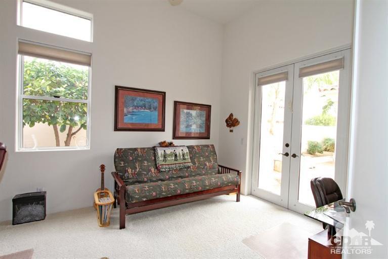 178 Loch Lomond Road Rancho Mirage, CA 92270 - Photo 25 of 32 a living room with furniture and a window