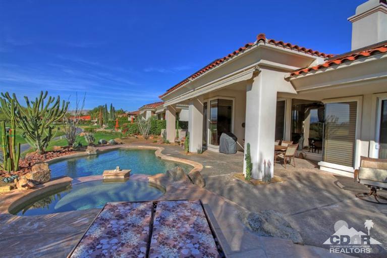 178 Loch Lomond Road Rancho Mirage, CA 92270 - Photo 28 of 32 a front view of a house with garden