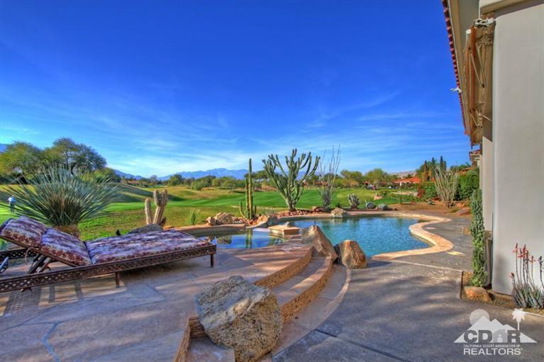 178 Loch Lomond Road Rancho Mirage, CA 92270 - Photo 29 of 32 a view of a swimming pool with a patio