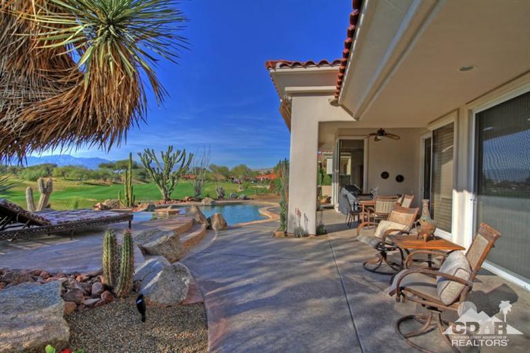 178 Loch Lomond Road Rancho Mirage, CA 92270 - Photo 30 of 32 a view of a backyard with furniture and a patio