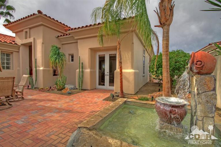 178 Loch Lomond Road Rancho Mirage, CA 92270 - Photo 8 of 32 a view of a house with backyard