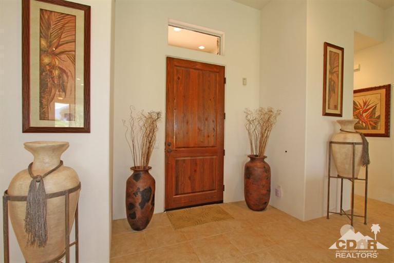 178 Loch Lomond Road Rancho Mirage, CA 92270 - Photo 9 of 32 a view of a room with gym equipment