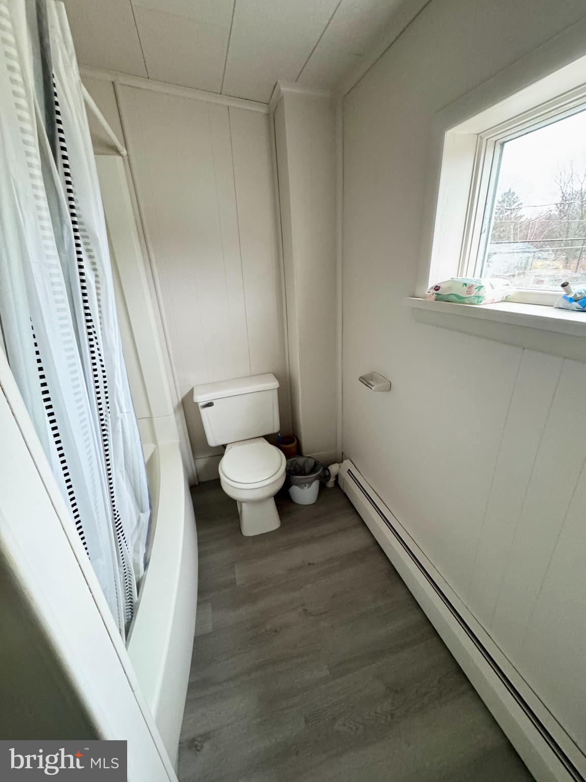 709 Summit Hill Road Ashland, PA 17921 - Photo 13 of 19 a bathroom with a toilet sink and window