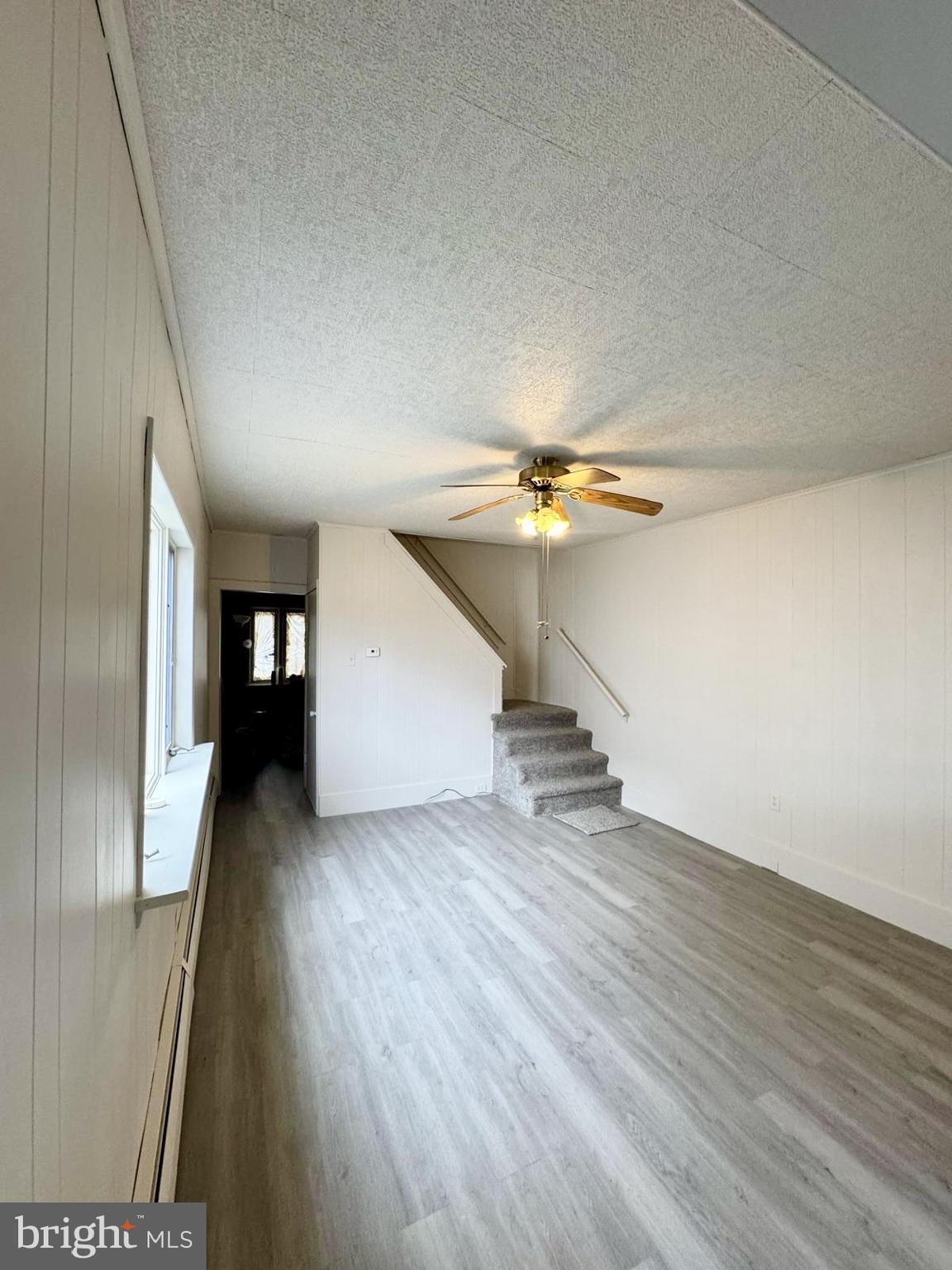 709 Summit Hill Road Ashland, PA 17921 - Photo 17 of 19 a view of an empty room with wooden floor