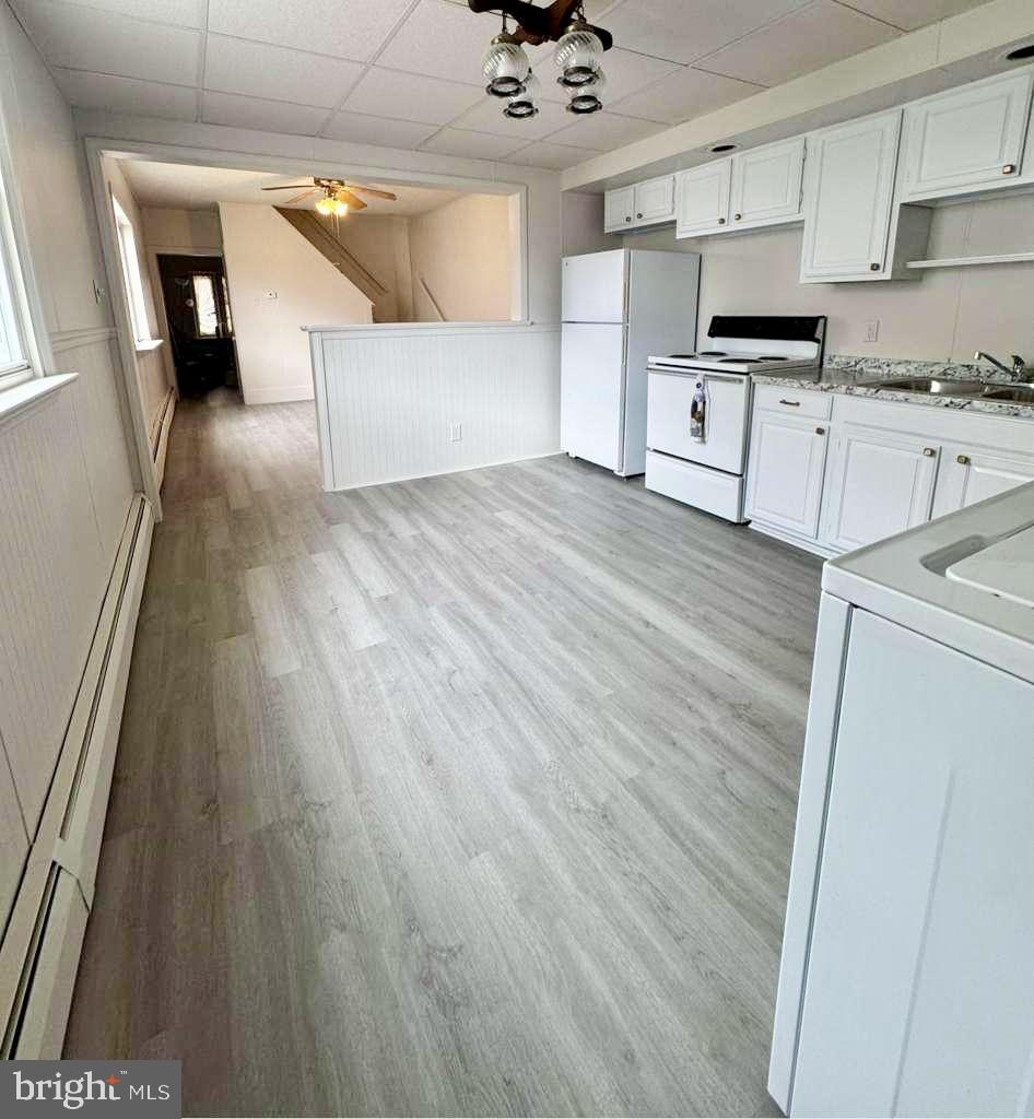 709 Summit Hill Road Ashland, PA 17921 - Photo 19 of 19 a kitchen with stainless steel appliances granite countertop a sink and cabinets
