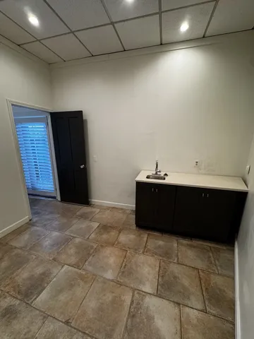 a bathroom with a bathtub and a sink