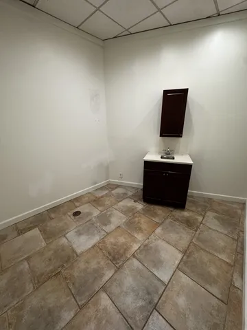 a living room with a couch and a flat screen tv