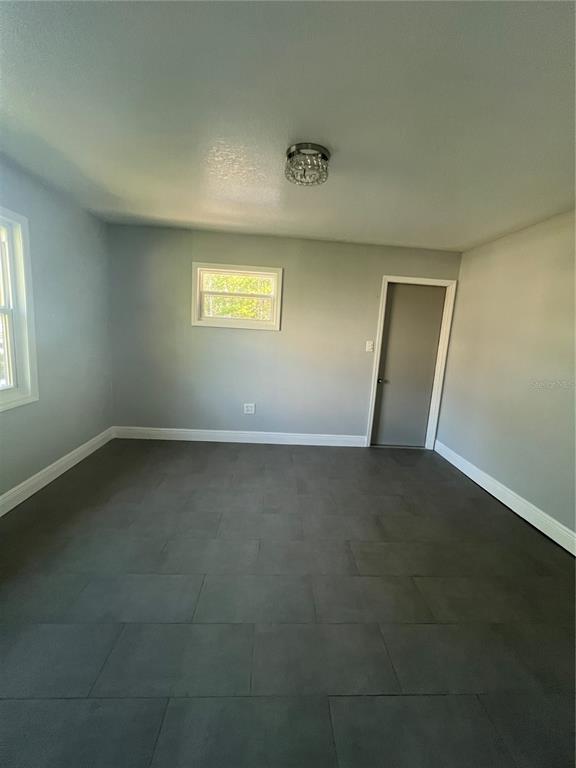 7222 Tropical Drive Weeki Wachee, FL 34607 - Photo 18 of 23 an empty room with a empty space and a window