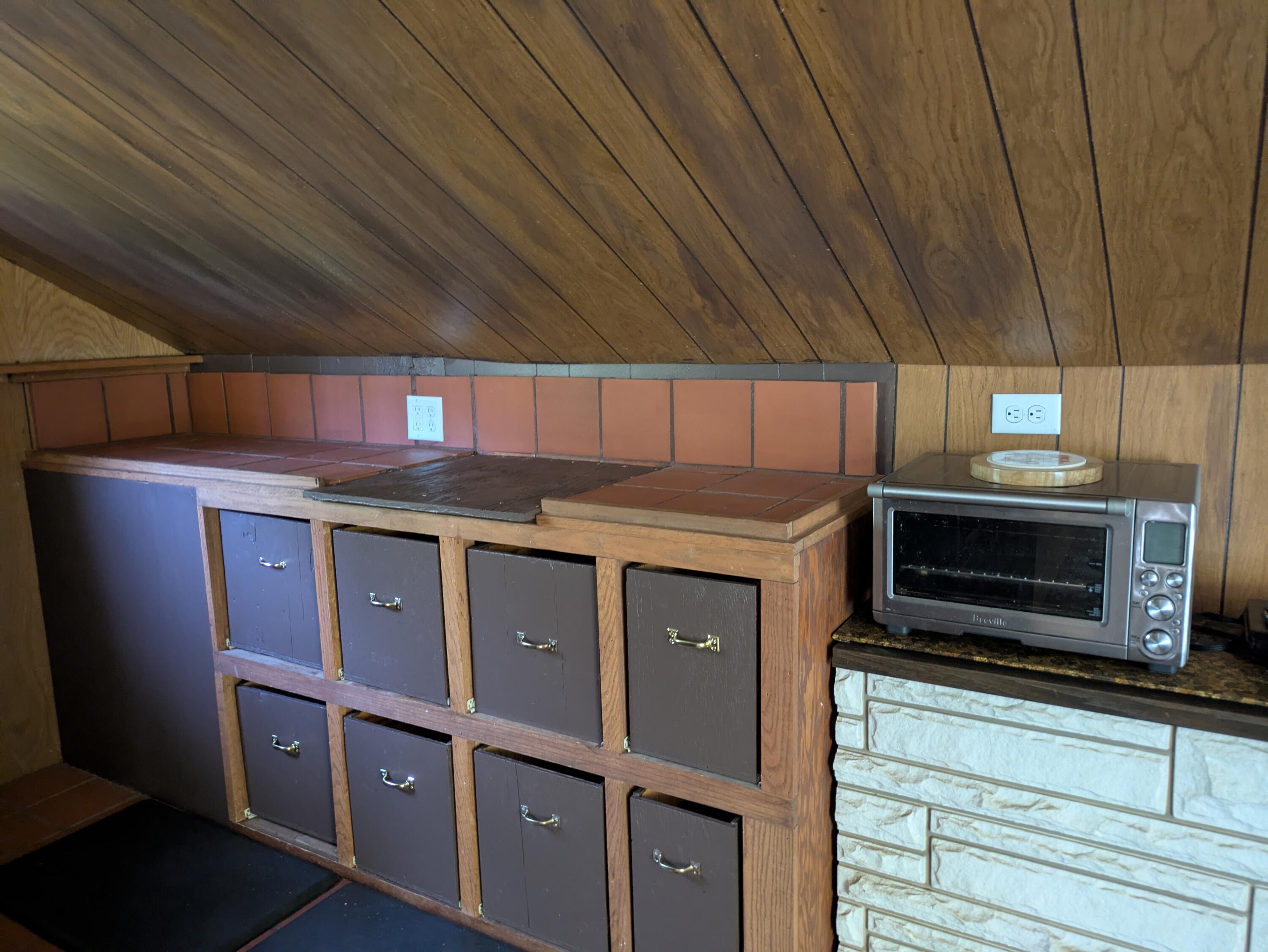 575 Kirkham Road Cave Junction, OR 97523 - Photo 40 of 45 a kitchen with cabinets and steel stainless steel appliances