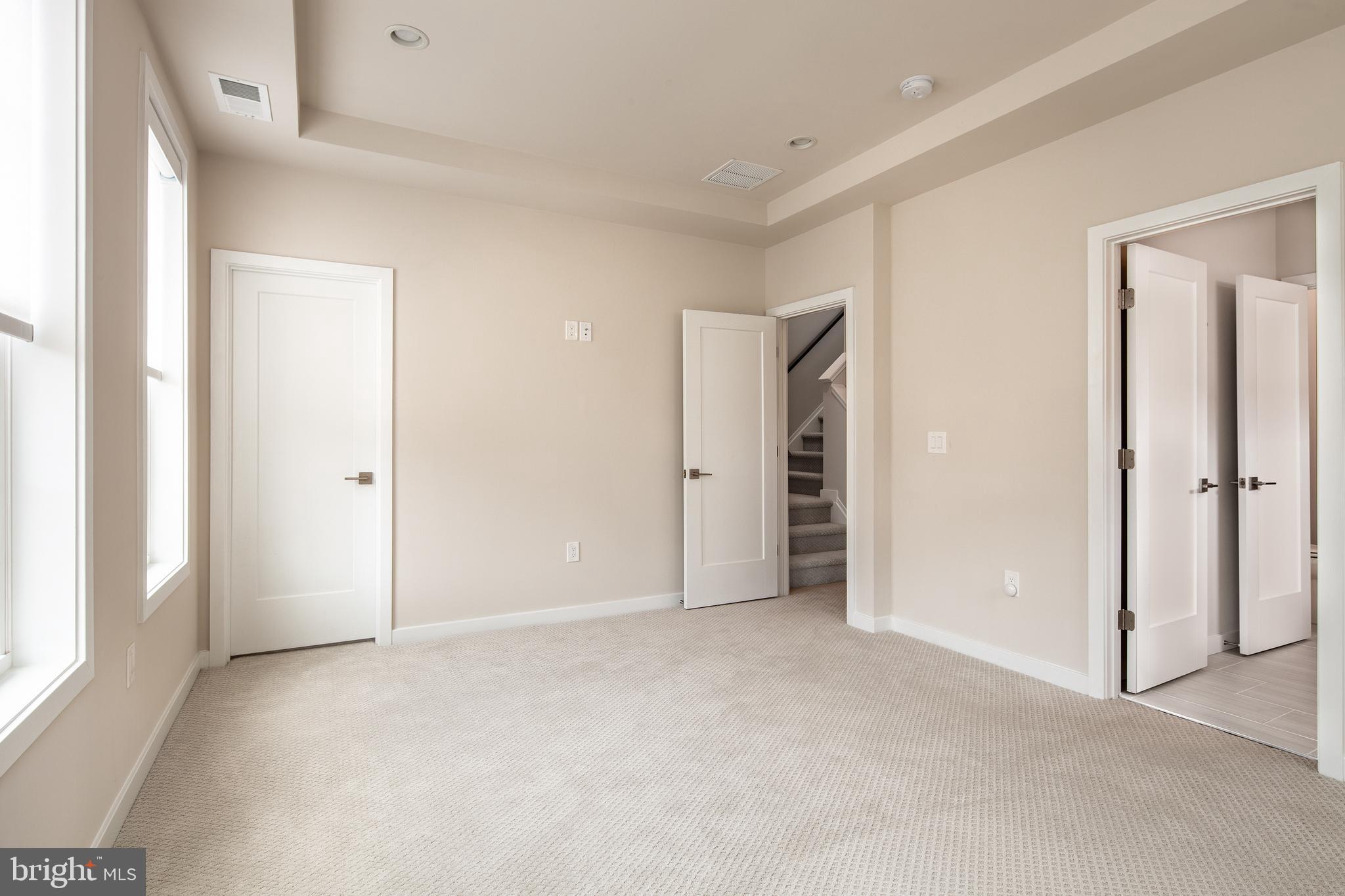1770 Violet Ridge Place McLean, VA 22102 - Photo 30 of 54 an empty room with closet and windows