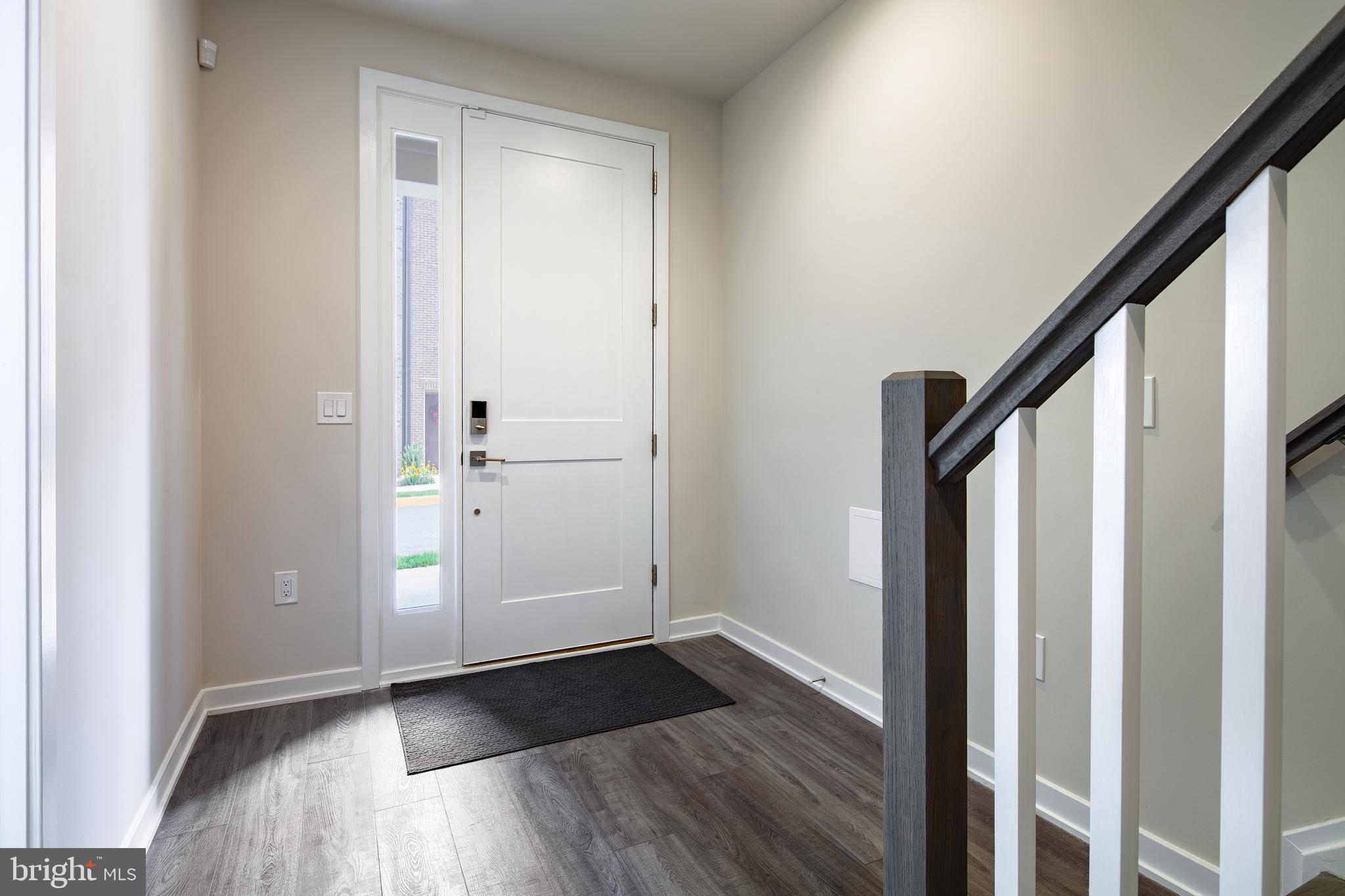 1770 Violet Ridge Place McLean, VA 22102 - Photo 4 of 54 a view of an entryway with wooden floor
