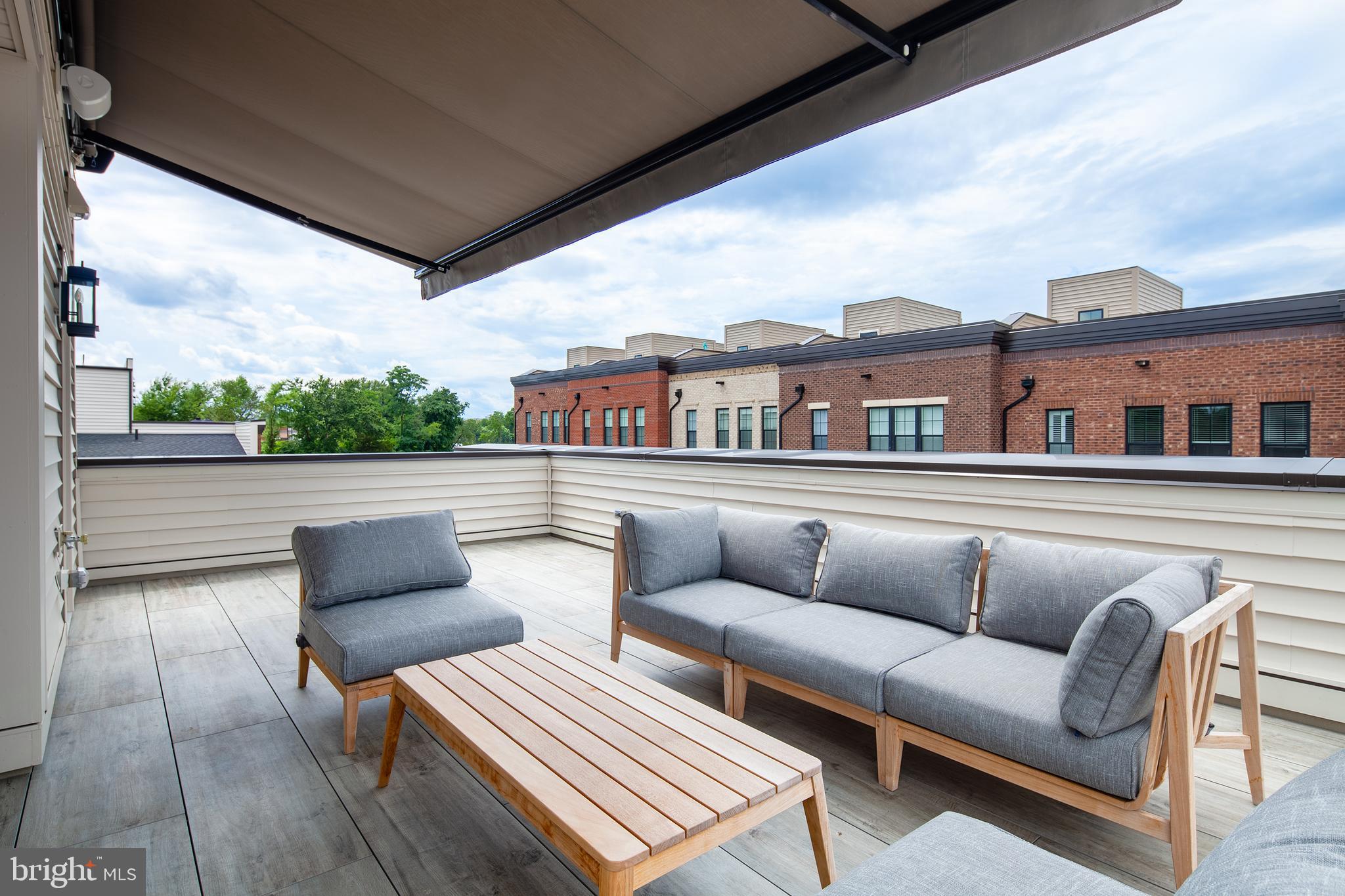 1770 Violet Ridge Place McLean, VA 22102 - Photo 44 of 54 a balcony with furniture and wooden floor