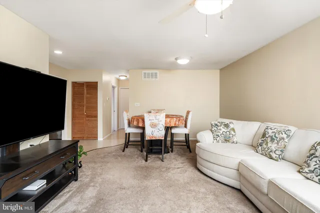 a view of a livingroom with furniture and a couch