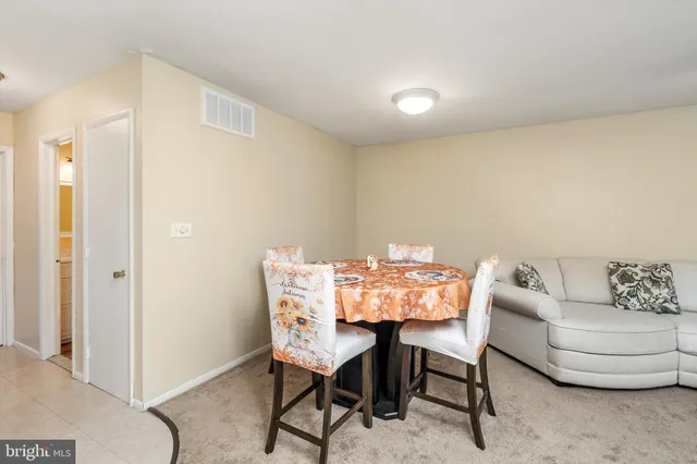 a kitchen with stainless steel appliances granite countertop a stove a sink dishwasher and a refrigerator