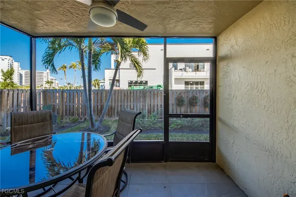 a view of a patio with furniture