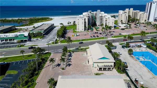 a view of a building with a yard