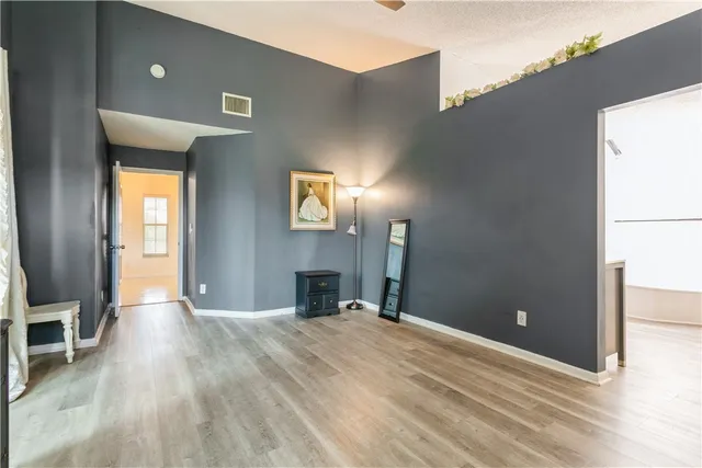a view of a livingroom with wooden floor