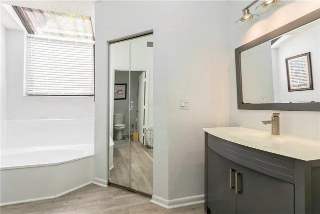 a bathroom with a sink and a bathtub