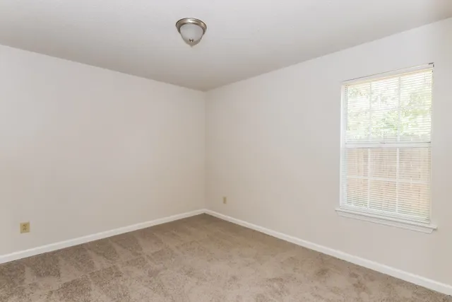 an empty room with a window