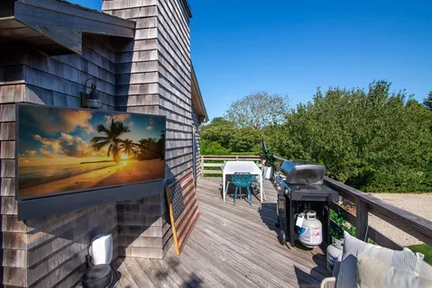 a view of a balcony with chairs