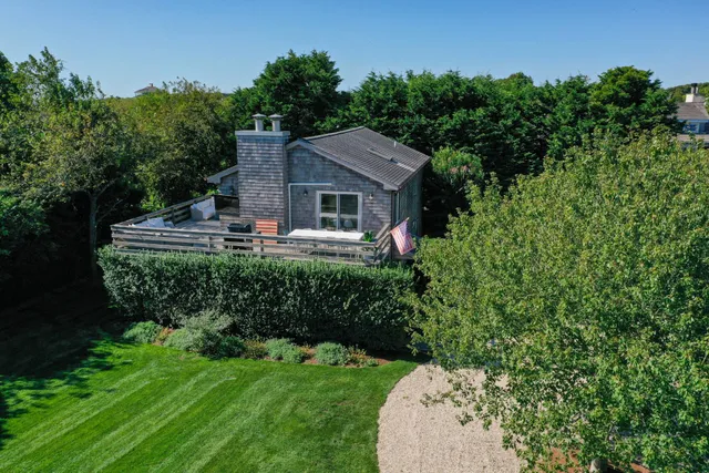 a house view with a garden space