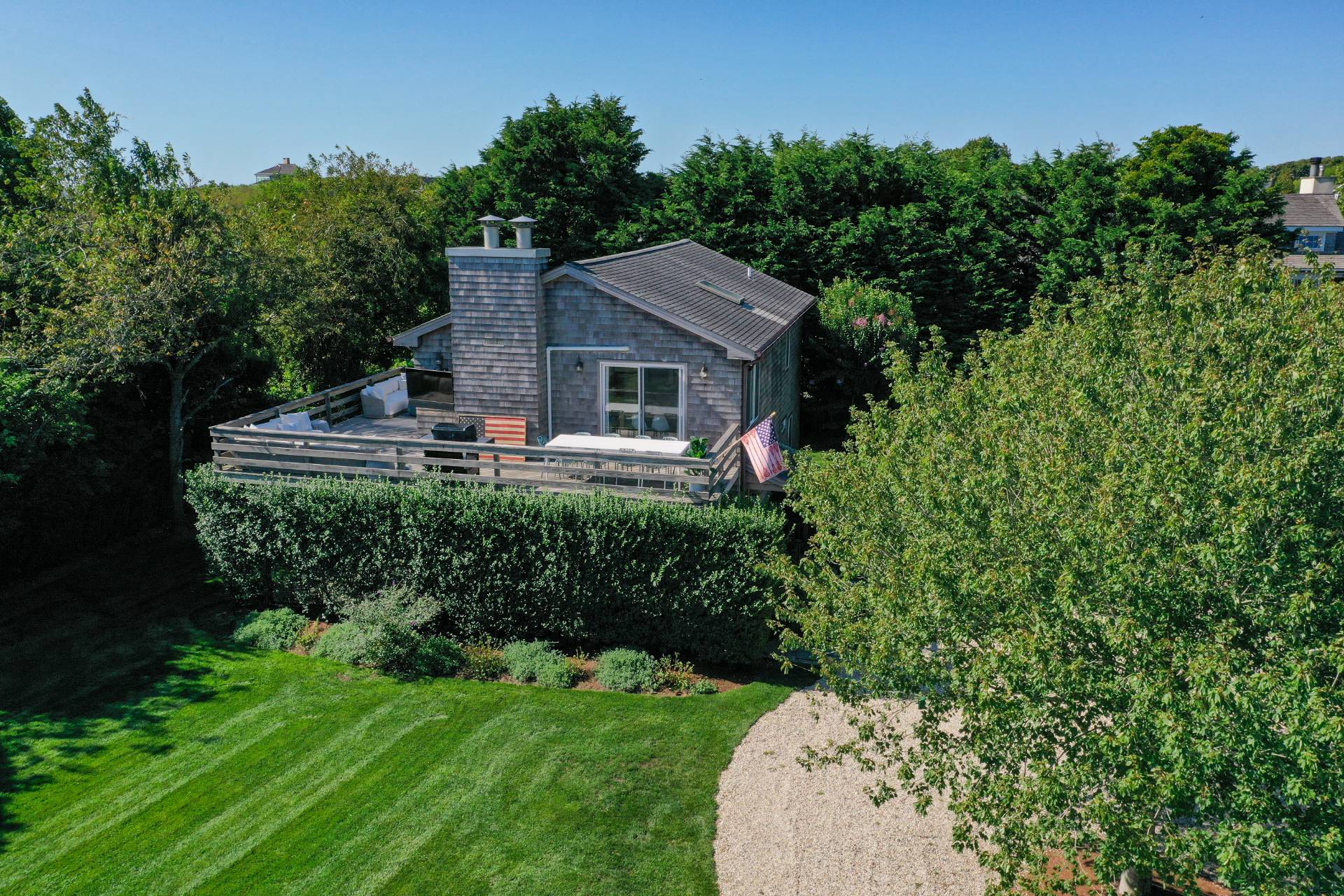28 Ditch Plains Road Montauk, NY 11954 - Photo 22 of 30 a house view with a garden space