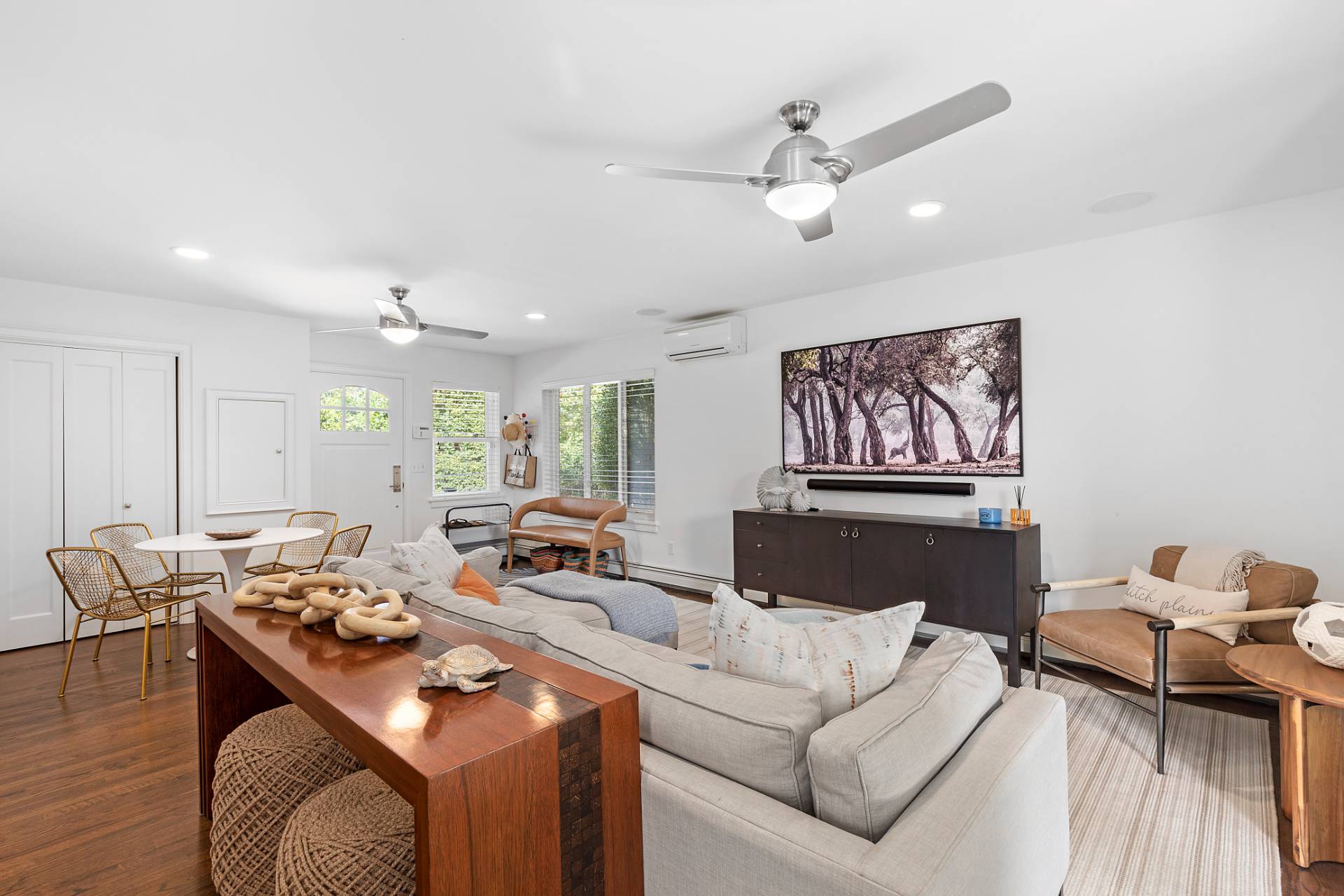 28 Ditch Plains Road Montauk, NY 11954 - Photo 7 of 30 a living room with furniture and a flat screen tv
