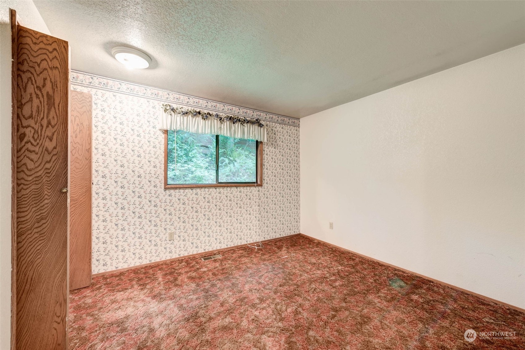 20821 30th Drive Southeast Bothell, WA 98021 - Photo 11 of 27 an empty room with windows