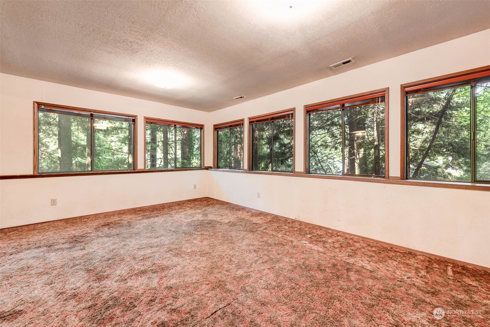 20821 30th Drive Southeast Bothell, WA 98021 - Photo 21 of 27 a view of an empty room with a window