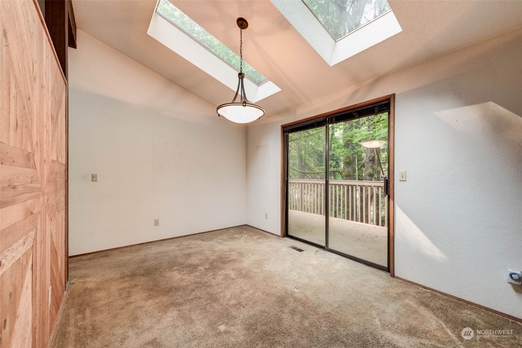 20821 30th Drive Southeast Bothell, WA 98021 - Photo 6 of 27 a view of an empty room with a window
