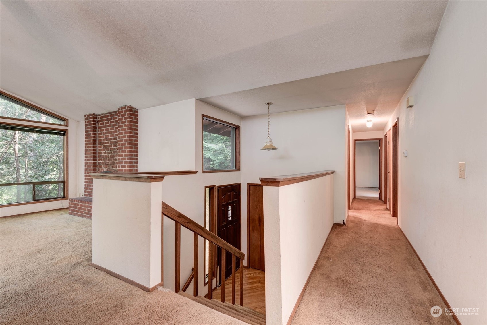 20821 30th Drive Southeast Bothell, WA 98021 - Photo 7 of 27 a view of a hallway with staircase