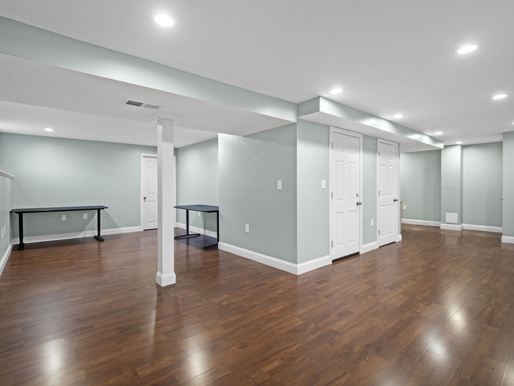 36 Knowlton Circle, Unit 1 Upton, MA 01568 - Photo 20 of 37 a view of empty room with wooden floor