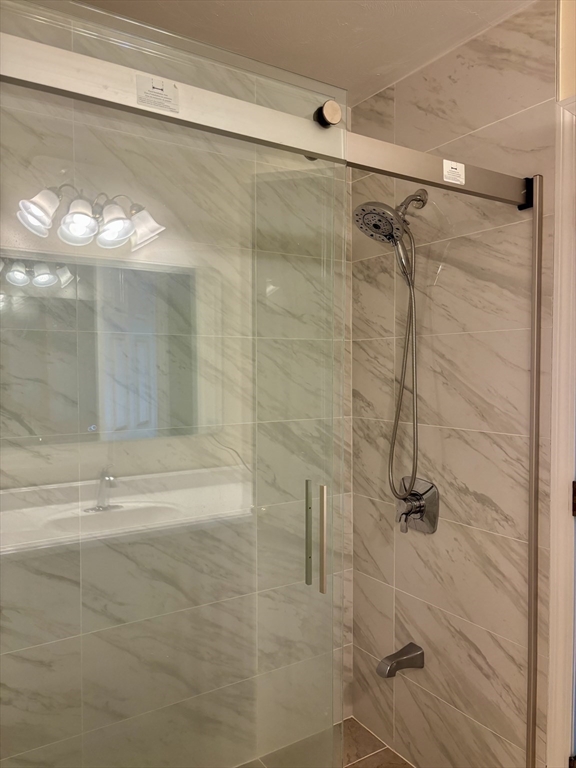 36 Knowlton Circle, Unit 1 Upton, MA 01568 - Photo 24 of 37 a bathroom with a shower