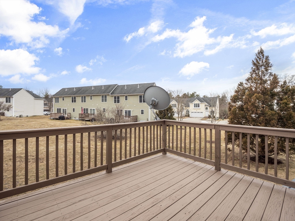 36 Knowlton Circle, Unit 1 Upton, MA 01568 - Photo 3 of 37 a view of city from a balcony