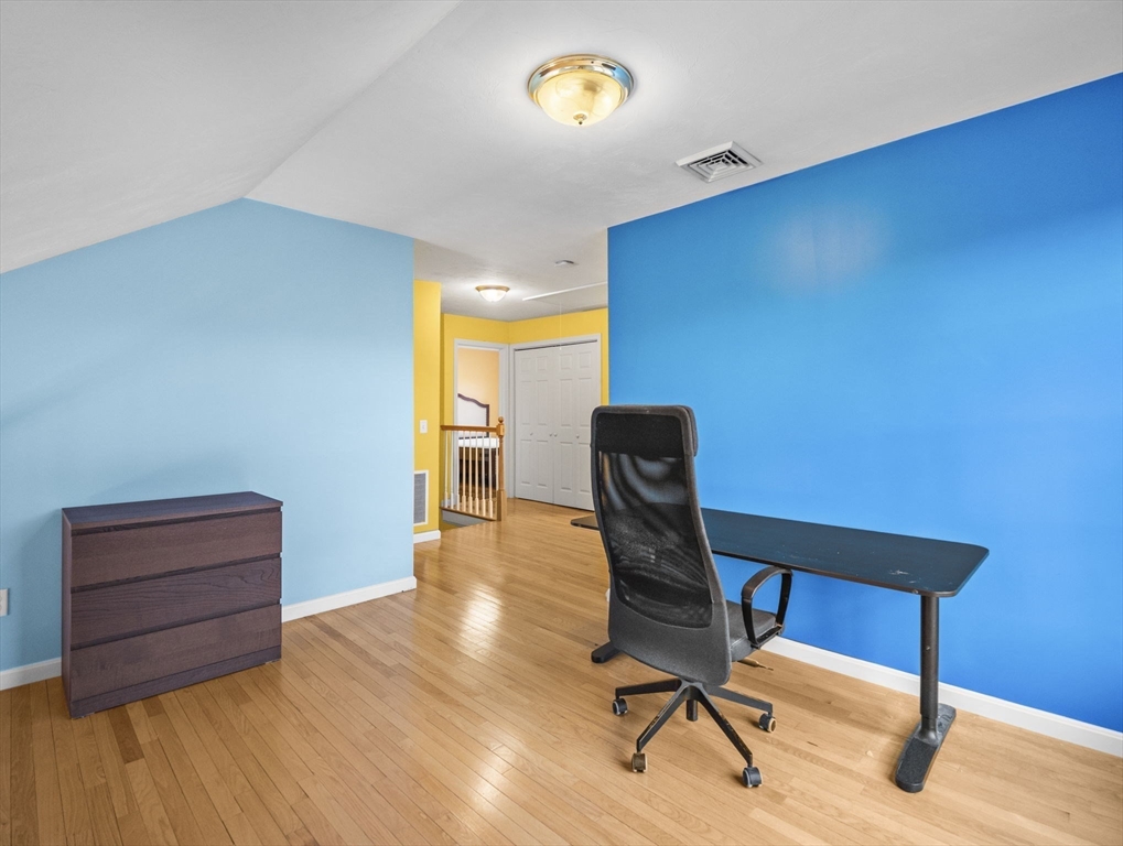 36 Knowlton Circle, Unit 1 Upton, MA 01568 - Photo 33 of 37 a view of a workspace with furniture and a window
